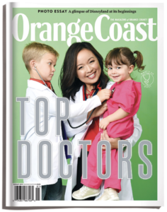 Orange Coast Top Doctors Magazine Cover Doctor in labcoat holding two kids, boy on left holding stethoscope to girl on right, green background