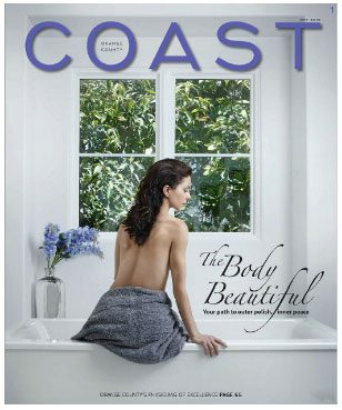 Coast Magazine Cover woman sitting on bath with back to camera