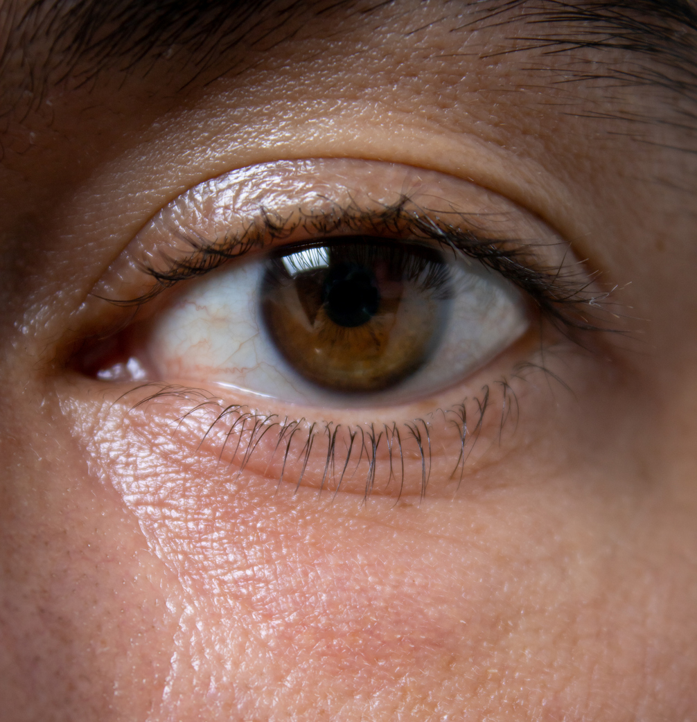 Close up image of brown eye.